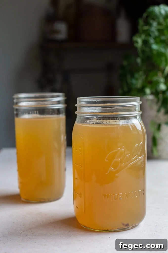 Mason jars of cooled bone broth