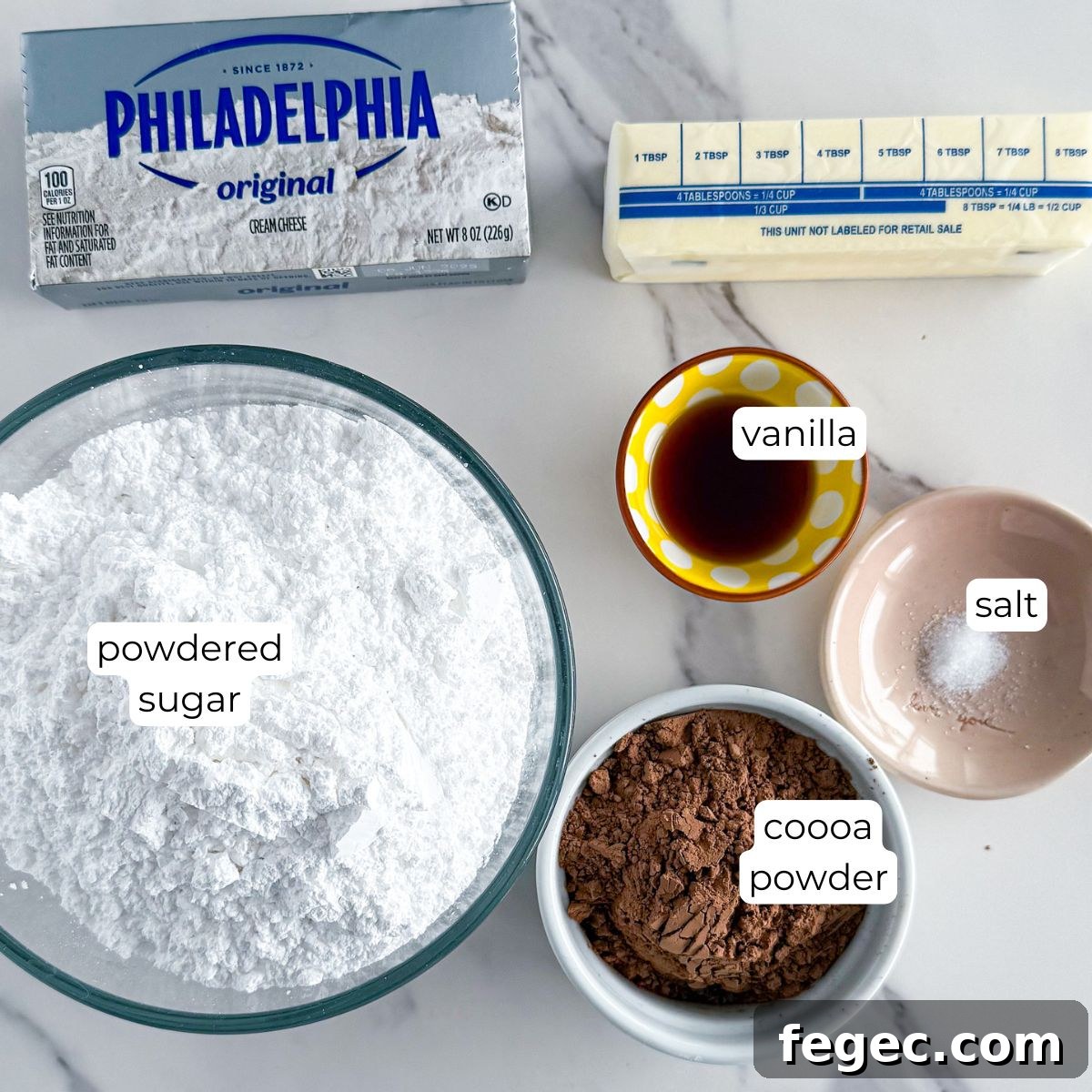 Ingredients for chocolate cream cheese frosting.