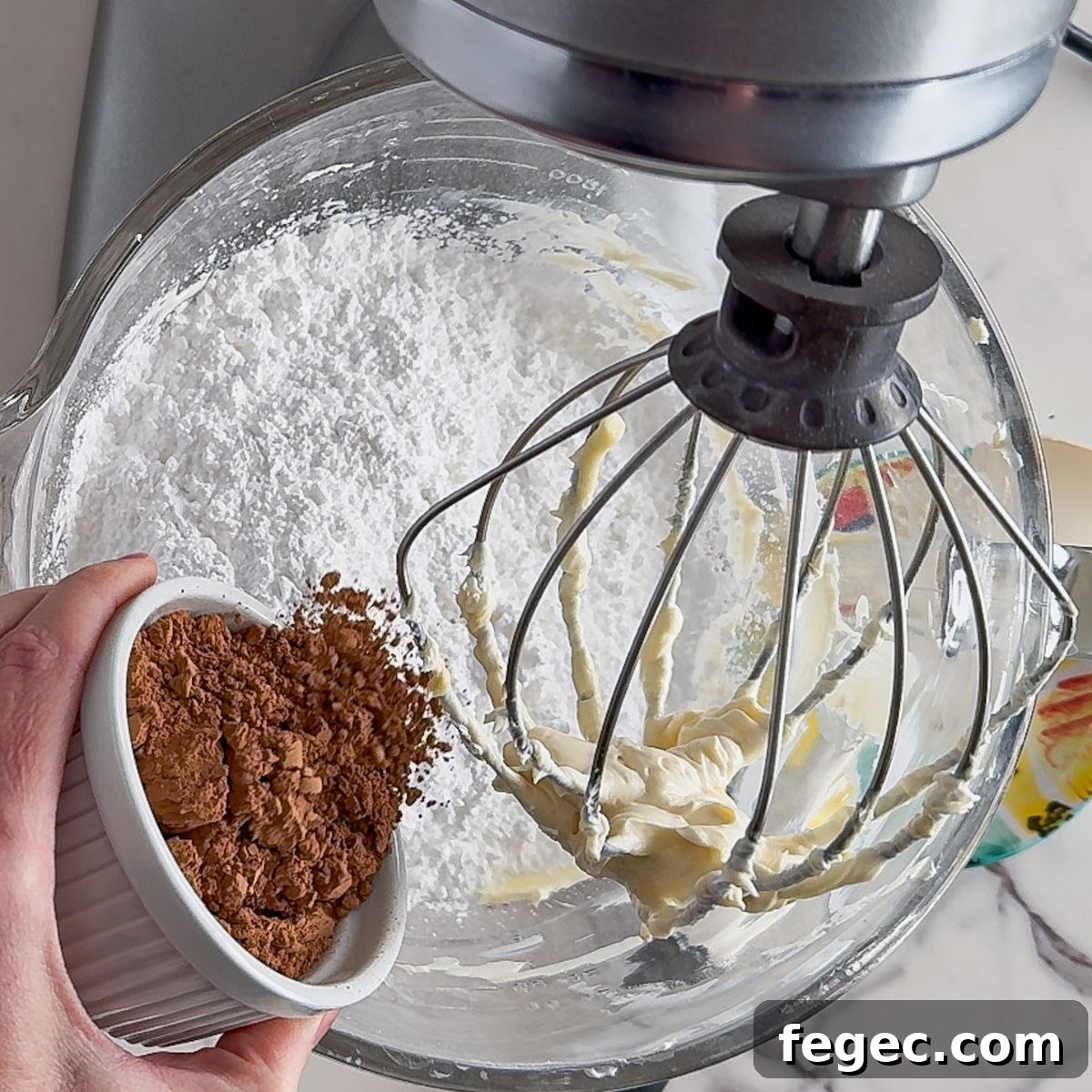 Adding the cocoa powder.