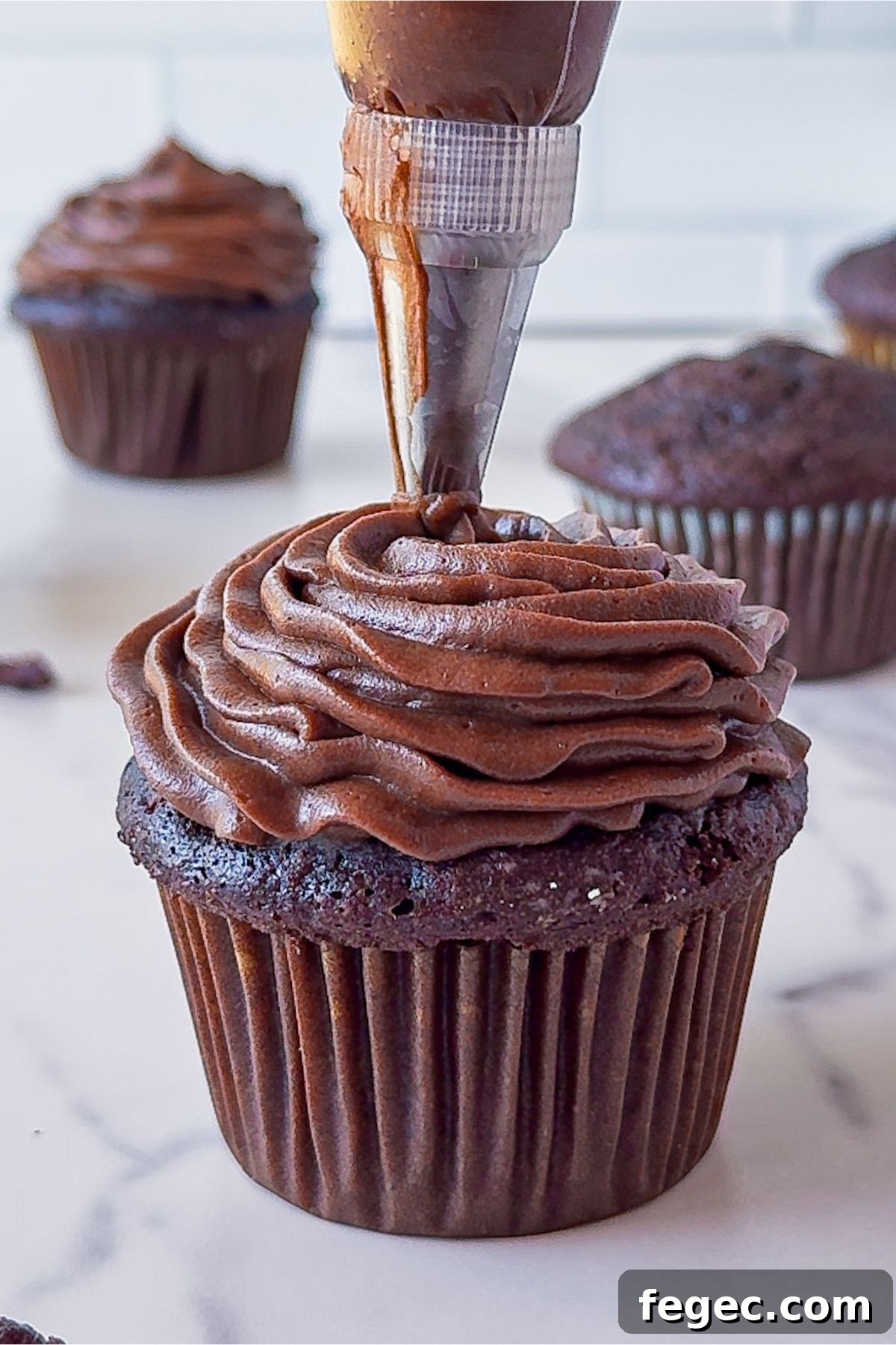 Chocolate Cream Cheese Frosting on a cupcake.