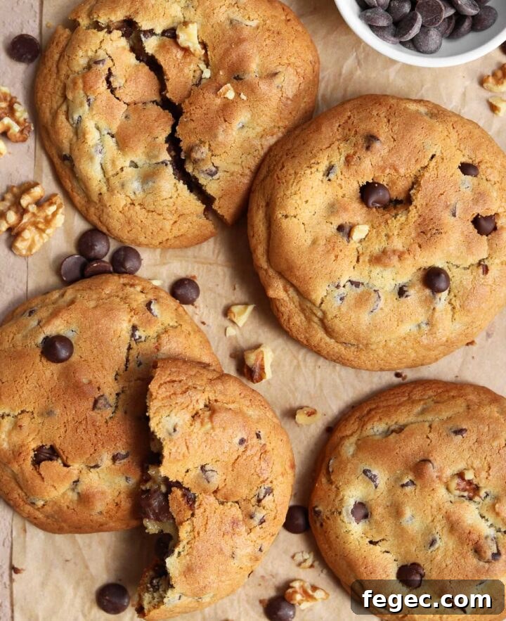top view of giant chocolate chip cookies on parchment paper