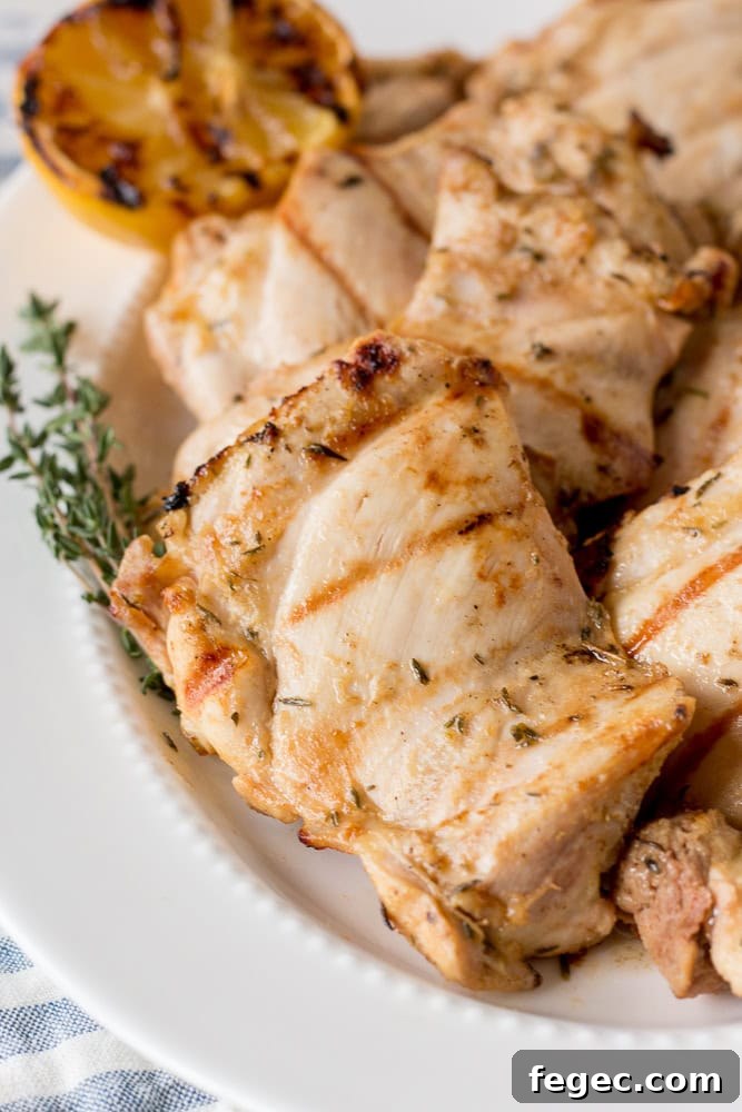whole30 dijon chicken thighs on a white plate