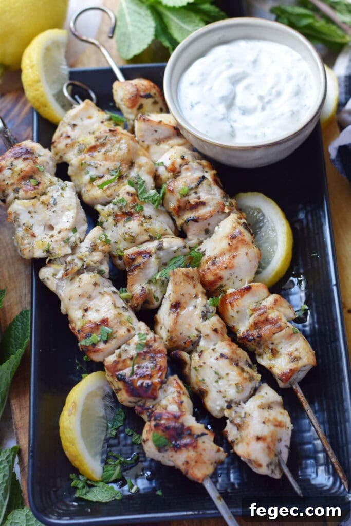 Chicken skewers with a dip.