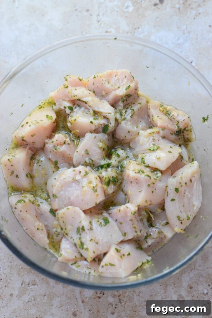 Marinaded chicken in a bowl.