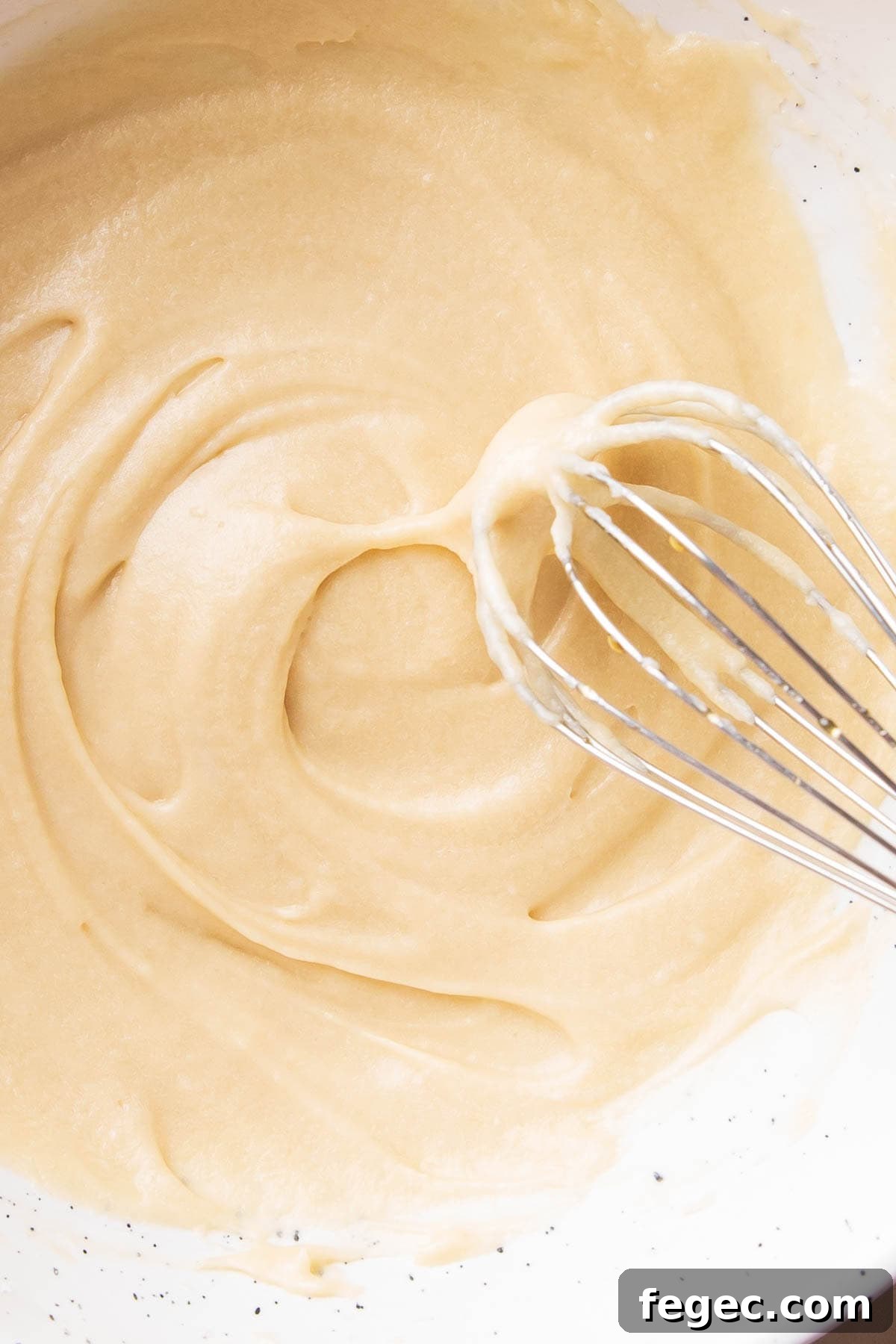 Showcasing the thick texture of this sweet fall-inspired dessert topping