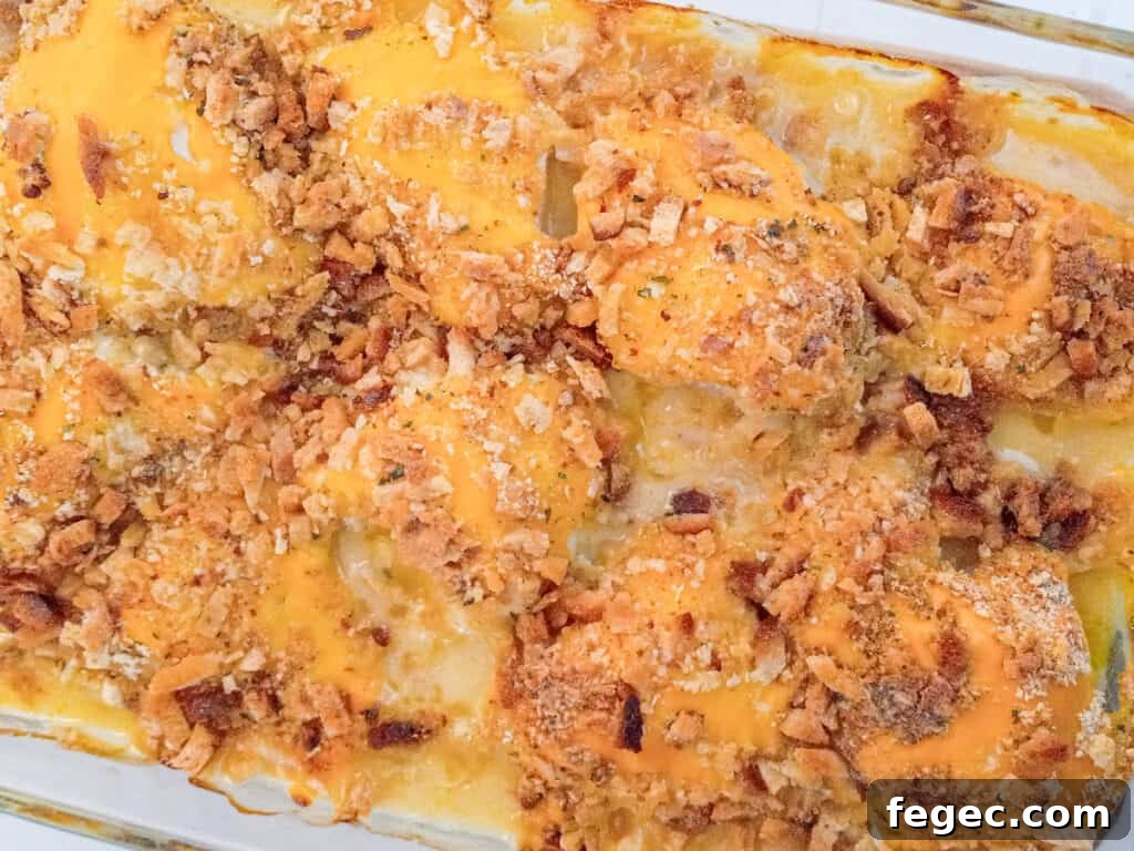 a pan of Amish baked chicken breast with stovetop stuffing, ready to eat